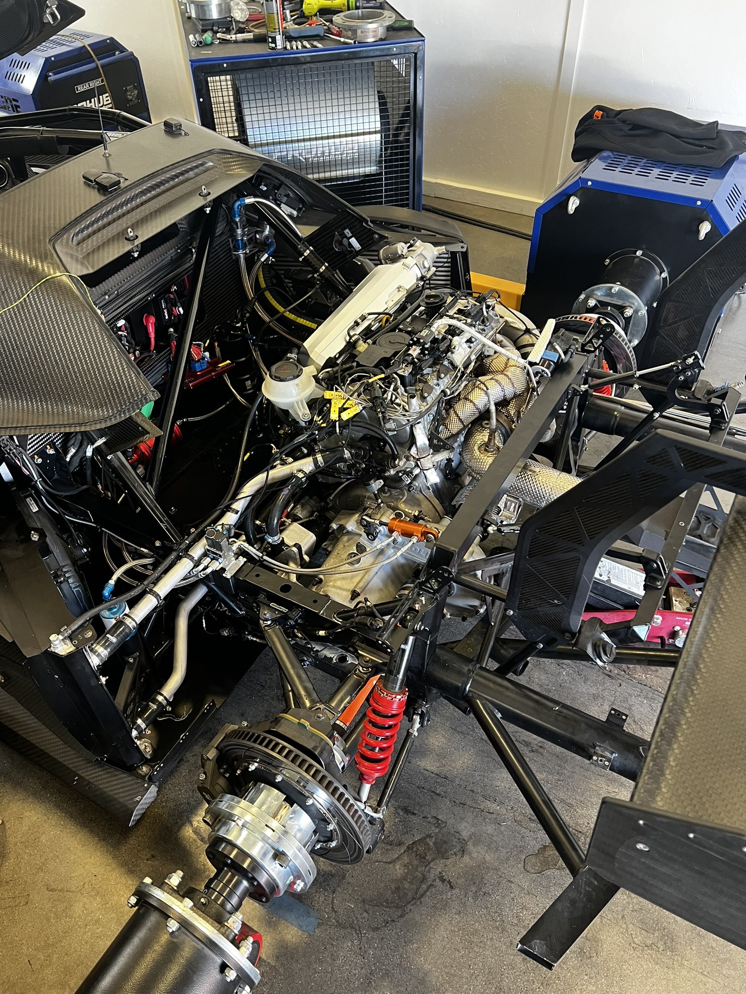 KTM GT2 driveline and rear suspension exposed during the build